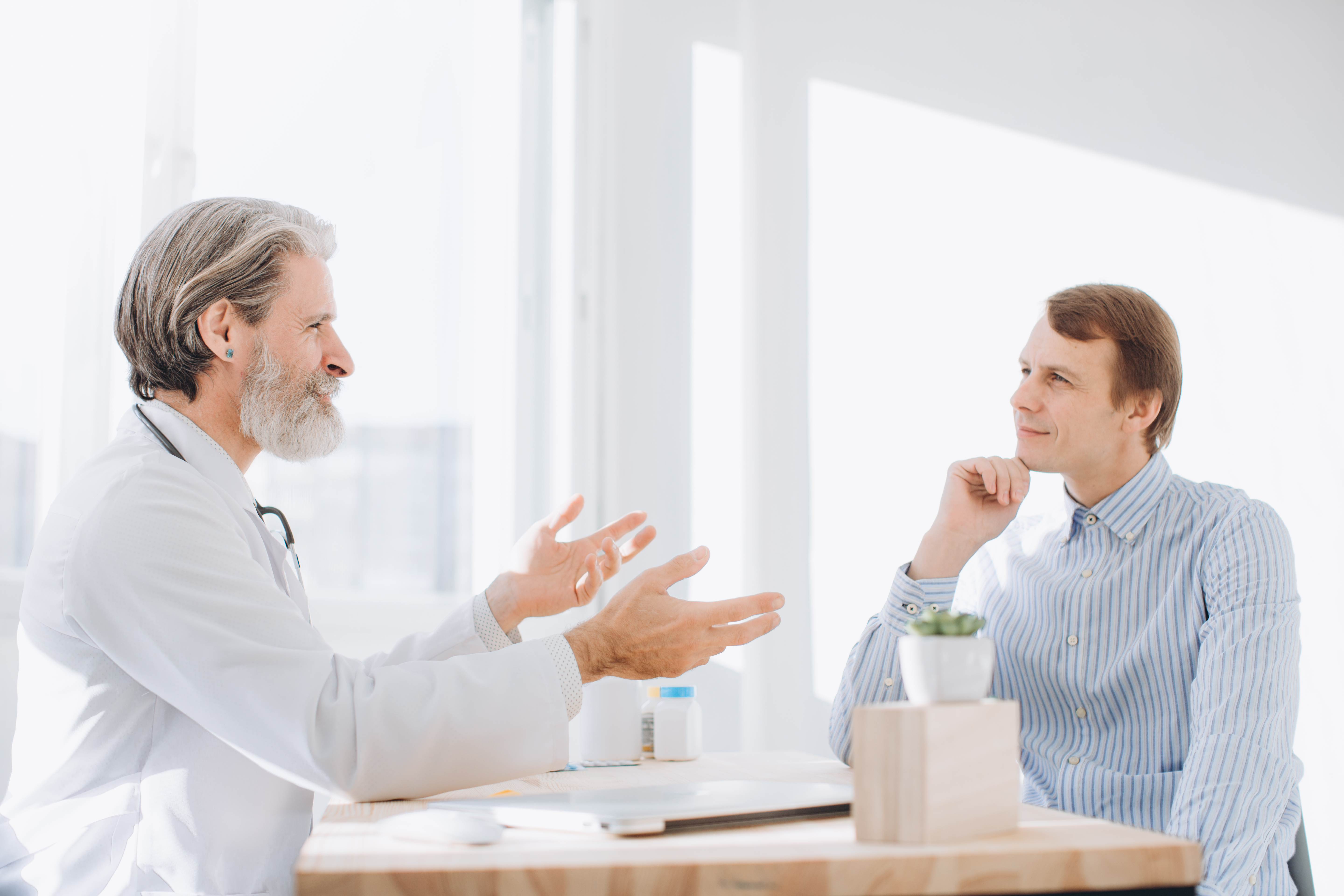 Doctor speaking with a patient during a medical consultation